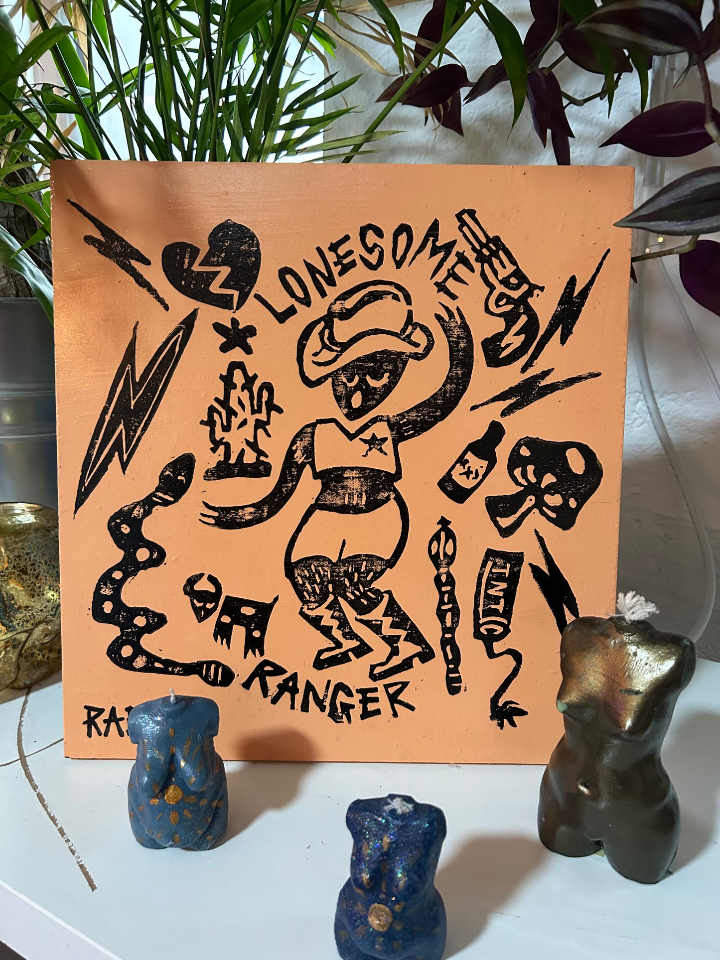 Lonesome Ranger varnished lino print on wood block