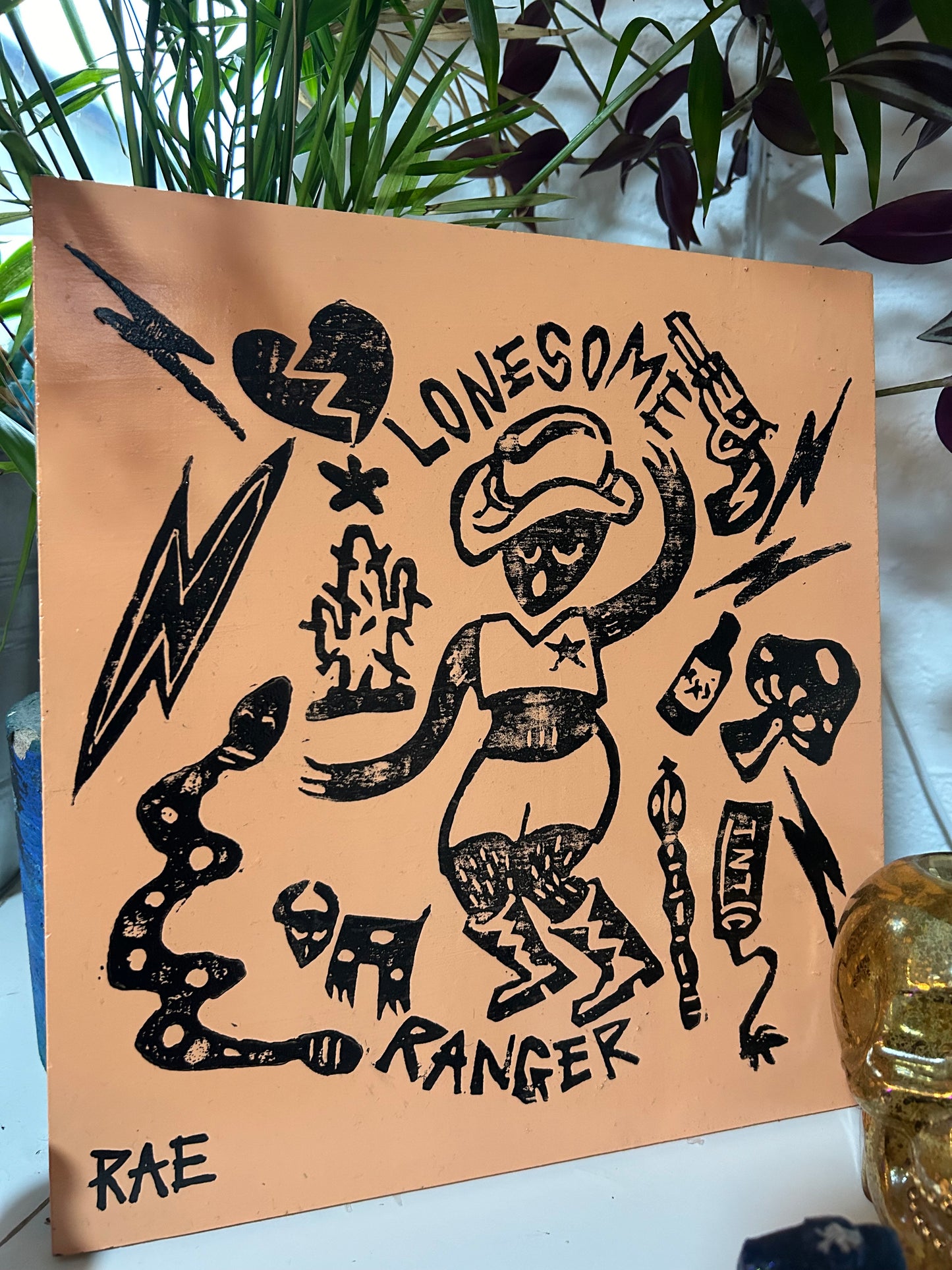 Lonesome Ranger varnished lino print on wood block